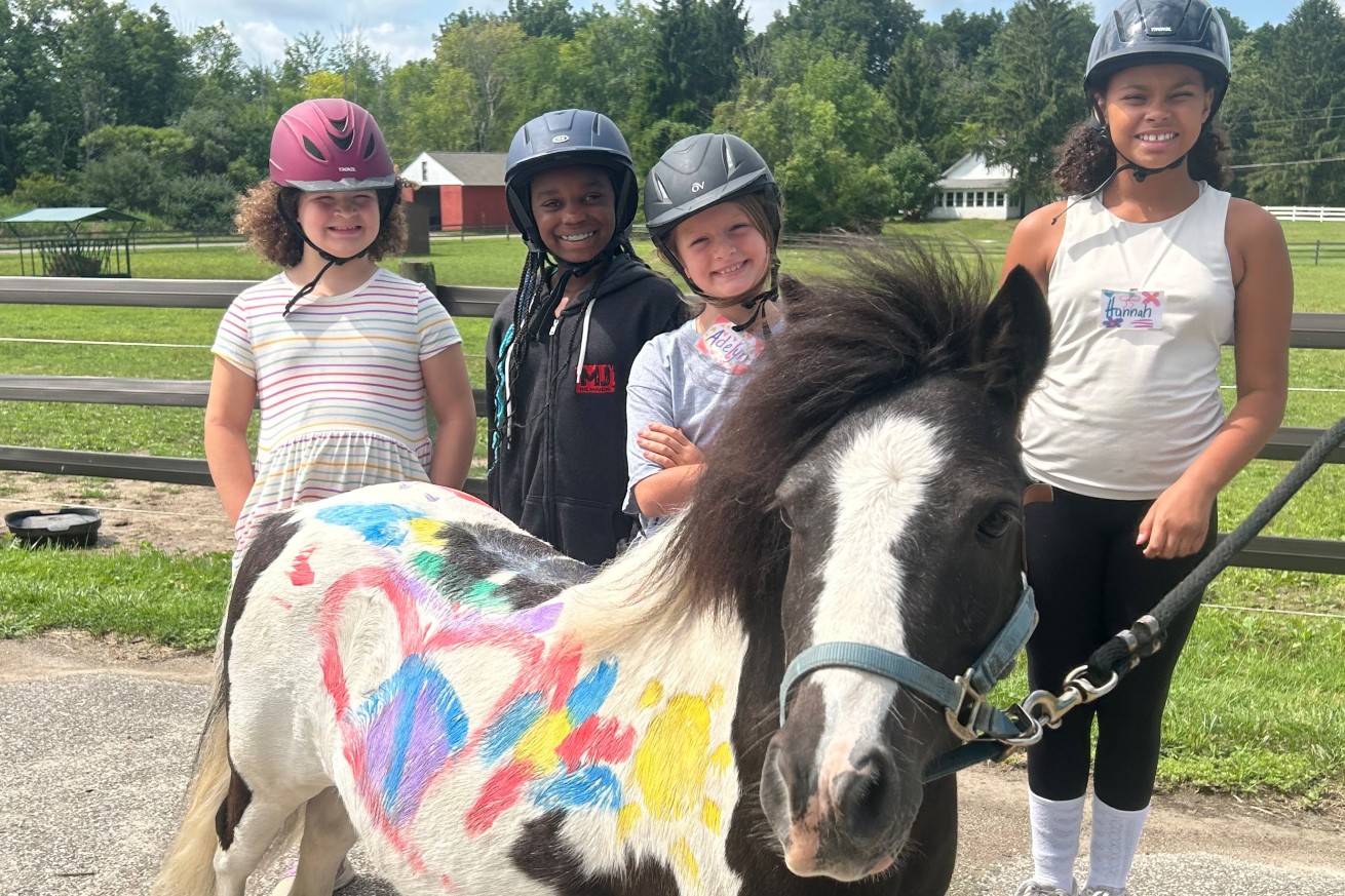 Summer Camp photo with painted horses